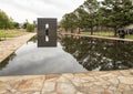 Granite walkway, reflective pool with 9:01AM wall and Field of Empty Chairs, Oklahoma City Memorial