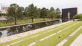 Granite walkway, reflective pool with 9:03AM wall and Field of Empty Chairs, Oklahoma City Memorial Royalty Free Stock Photo