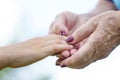 Granmother and niece holding hands Royalty Free Stock Photo