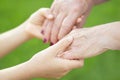 Granmother and niece holding hands Royalty Free Stock Photo