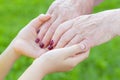 Granmother and niece holding hands Royalty Free Stock Photo