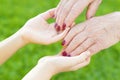 Granmother and niece holding hands Royalty Free Stock Photo