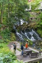Granna, Sweden - 08.05.2025: Tourists at Rottle Vattenfall Waterfall in Sweden Royalty Free Stock Photo
