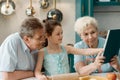 Granny, grandpa and granddaughter