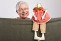 Granny presenting a puppet show Royalty Free Stock Photo