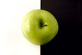 Granny Smith apple on artistic background Royalty Free Stock Photo