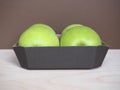 Granny Smith apple fruit food in cardboard basket Royalty Free Stock Photo