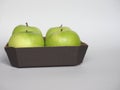 Granny Smith apple fruit food in cardboard basket Royalty Free Stock Photo