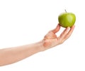 granny smith apple in hand Royalty Free Stock Photo