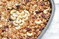 Granola in a baking dish, cashew in the shape of heart. Food concept. Close-up Royalty Free Stock Photo