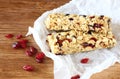 Granola bar or energy bar on wooden background Royalty Free Stock Photo