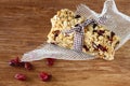 Granola bar or energy bar on wooden background Royalty Free Stock Photo