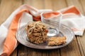 Granola bars with empty glass on wooden background Royalty Free Stock Photo