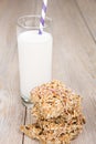 Granola cereals bars and glass of milk Royalty Free Stock Photo