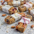 Granola energy bars with figs, oatmeal, almond, dry cranberry, chia and sunflower seeds, square format Royalty Free Stock Photo