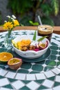 Granola with greek yogurt, honey, fresh fruits, chia seeds served with ice americano Royalty Free Stock Photo