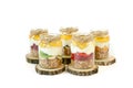 Granola, slices of different fresh fruits, yogurt, honey in jars isolated on white background. Royalty Free Stock Photo