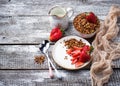 Granola with yogurt and strawberries