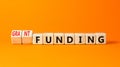 Grant funding symbol. Concept words Grant funding on beautiful wooden blocks. Beautiful orange table orange background. Business Royalty Free Stock Photo