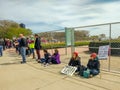 Demonstrators take a break at the March for Science in Chicago.