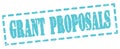 GRANT PROPOSALS text written on blue stamp sign