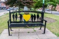 GRANTHAM, ENGLAND- 26 June 2022: Coronavirus memorial bench in Grantham