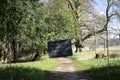 Grantham, Linconshire, EnglaBelton house clarification sign written in chalk on a blackboard suspended on