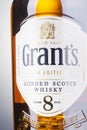 Grants blended whisky on gradient background. Royalty Free Stock Photo