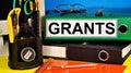 Grants. Text label in the folder. Royalty Free Stock Photo