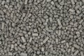 Granules of activated carbon black background Royalty Free Stock Photo