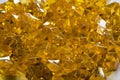 Granules of the transparent yellow plastic in the form of jewels