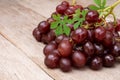 red grapes wood background