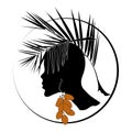 Black silhouette of a female head with palm leaf hairstyle and date fruit earring with round frame.