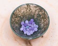 Grape Agate Balls from Indonesia in Moss Agate hand carved polished bowl from Morocco.