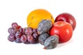 Grape, apple, orange and dry persimmon isolated on white background Royalty Free Stock Photo