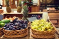 Grape in baskets with nameplates at food market Royalty Free Stock Photo