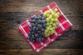 Grape. Bunch of multicolored grapes on rustic wooden table