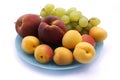 Grape bunch, peaches and apricot close-up Royalty Free Stock Photo