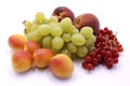 Grape bunch, peaches, red currants and apricot close-up Royalty Free Stock Photo