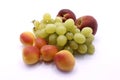 Grape bunch, peaches and ripe apricot close-up Royalty Free Stock Photo