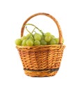 Grape bunch in wicker basket isolated close up Royalty Free Stock Photo
