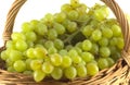 Grape bunch in wicker basket isolated close up Royalty Free Stock Photo