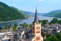 Grape Escape Rhine Valley, medieval German Bacharach city, Old Post Compound With Postenturm, wide waters of Rhine River, slate Royalty Free Stock Photo