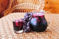 Grape juice on the table Royalty Free Stock Photo