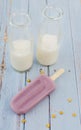 Grape Popsicle Whit Milk in Blue Background