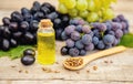 Grape seed oil in a small bottle. Selective focus