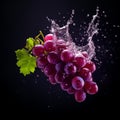 Grape with water splash, isolated on black background Royalty Free Stock Photo