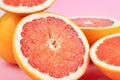 Grapefruit citrus fruits closeup on pink background Royalty Free Stock Photo