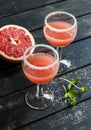 Grapefruit cocktail on a dark background