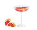 Grapefruit cocktail in a martini glass with a ruby-red slice of grapefruit. Royalty Free Stock Photo